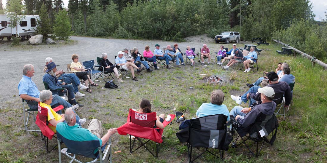 People circled around a campfire